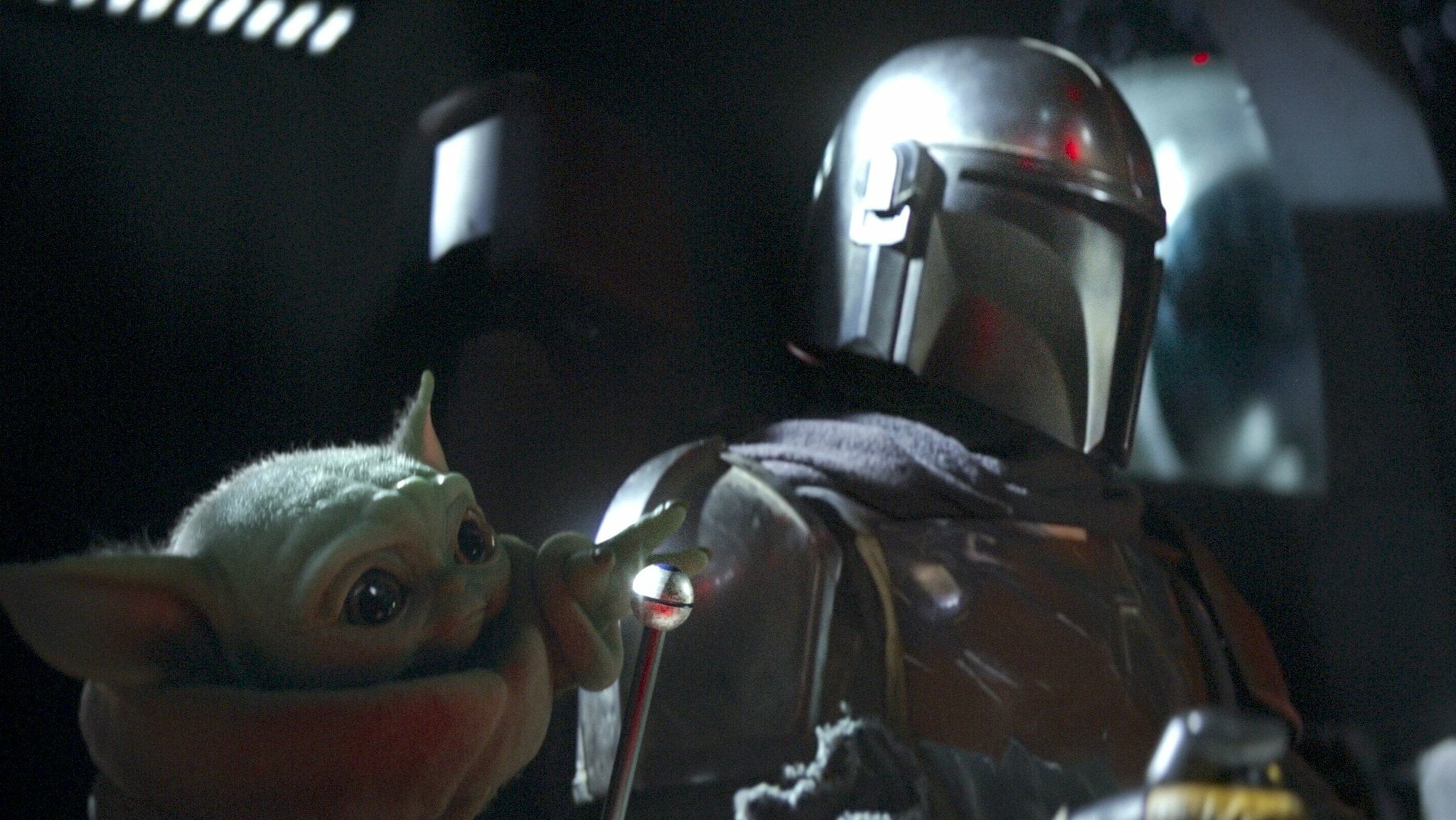 Personagem Mandalorian e 'bebê Yoda', da série The Mandalorian (Foto: Reprodução/Disney)