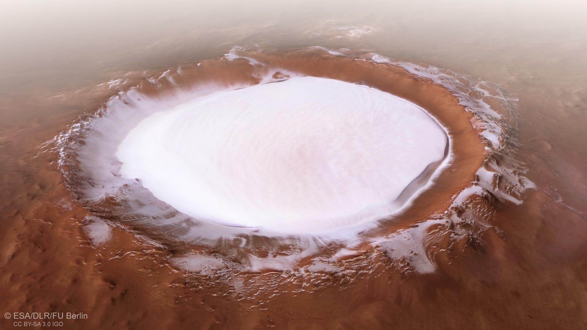 Esta imagem da Mars Express da ESA mostra a cratera de Korolev, uma área de 82 quilômetros de diâmetro encontrada nas terras baixas do norte de Marte. (Foto: ESA)