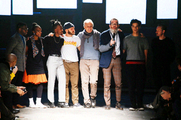 From left, Walé Oyéjidé of Ikiré Jones; Gozi Ochonogor  of U.Mi-1; Lukhanyo Mdingi and Nicholas Coutts; Lai-momo president, Andrea Marchese; Simone Cipriani of the Ethical Fashion Initiative; and Jody Paulsen and Keith Henning of AKJP. The designers showcased their Autumn/Winter 2016 collections in Florence at Pitti Uomo 89, highlighting the creative and contemporary fashion culture emanating from the African continent.   Selected and supported by ITC Ethical Fashion Initiative, this was the second showcase of the African Designer Programme at Florence’s Menswear tradeshow, Pitti Uomo, to raise awareness of African fashion as well as social issues.   The Ethical Fashion Initiative partnered with Lai-momo, an Italian organisation working with migrants, and cast three asylum seekers as models in the show.    “Africa is one of today’s creative poles and this show proves that African designers speak about art, life and innovation. At the same time, we are in an age in which many Africans come to Europe as migrants. We believe in a programme that enables them to work in the value chain of fashion,” said Simone Cipriani, Head of the Ethical Fashion Initiative.   (Foto: Alberto Maddaloni / indigitalimages.com)