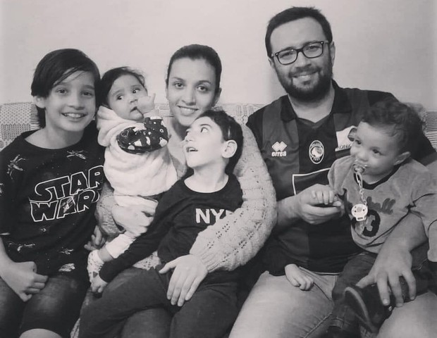 Miguel com a família (Foto: Reprodução Facebook)