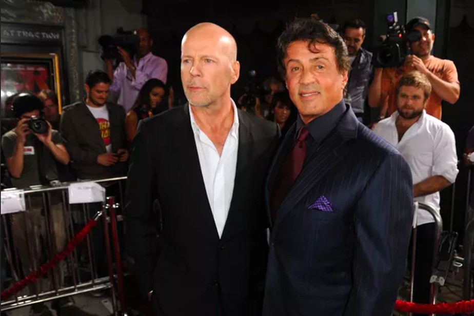 Bruce Willis e Sylvester Stallone em evento em Los Angeles em outubro de 2010