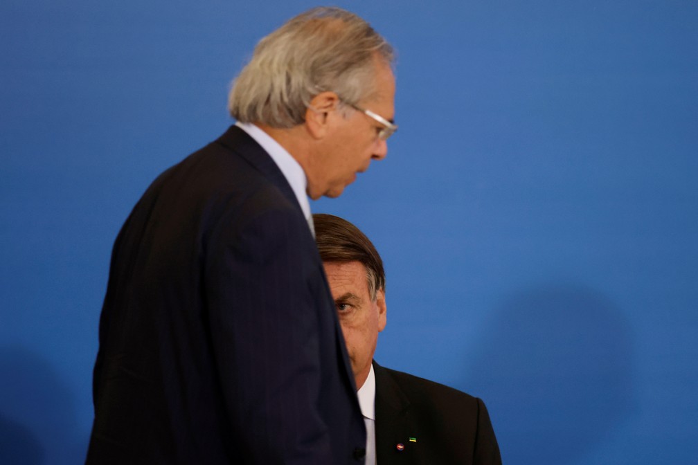 O ministro da Economia, Paulo Guedes, e o presidente Jair Bolsonaro — Foto: Ueslei Marcelino/Reuters