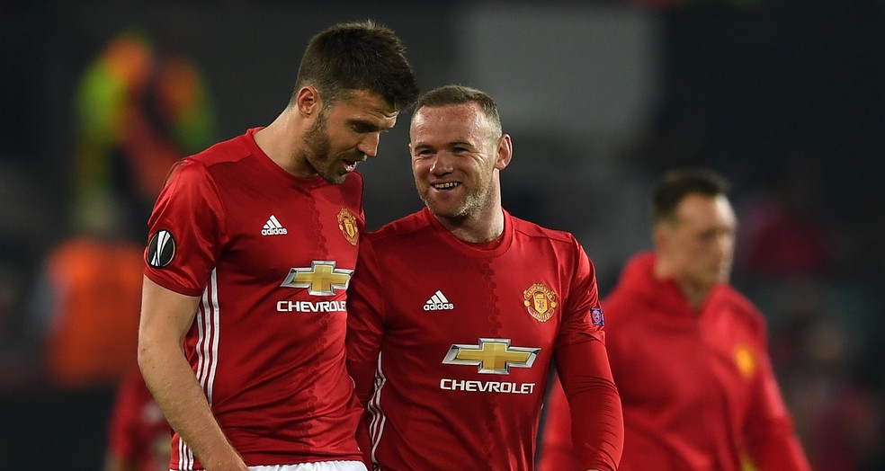 Carrick e Rooney foram companheiros no United por 11 temporadas e voltarão a ser rivais (Foto: Gareth Copley/Getty Images)