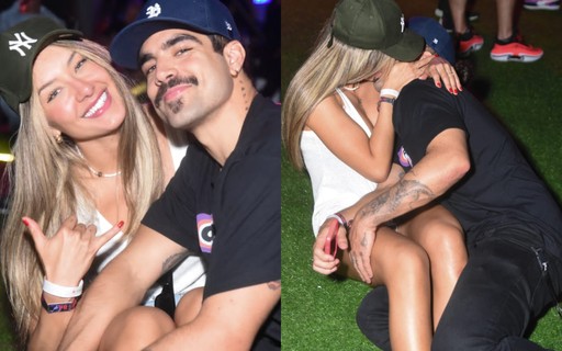 Caio Castro troca beijos com namorada no Rock in Rio