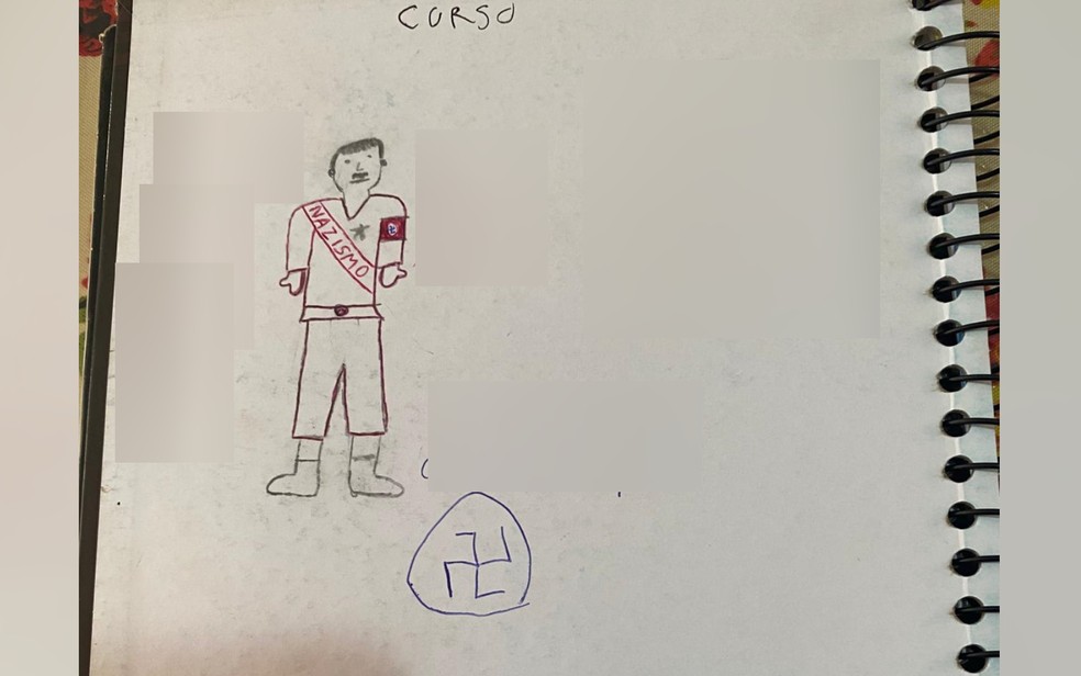Caderno de adolescente apreendido em Goiânia tem desenho feito à mão que mostra admiração ao nazismo — Foto: Reprodução/TV Anhanguera