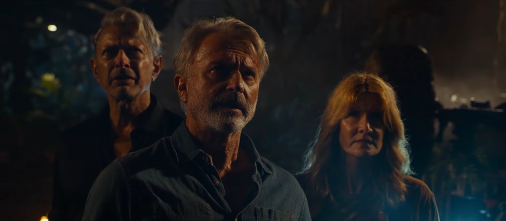 Em 'Jurassic World Domínio', trio formado por Laura Dern como Dra. Ellie Sattler, Sam Neill como Alan Grant e Jeff Goldblum retorna à franquia — Foto: Reprodução