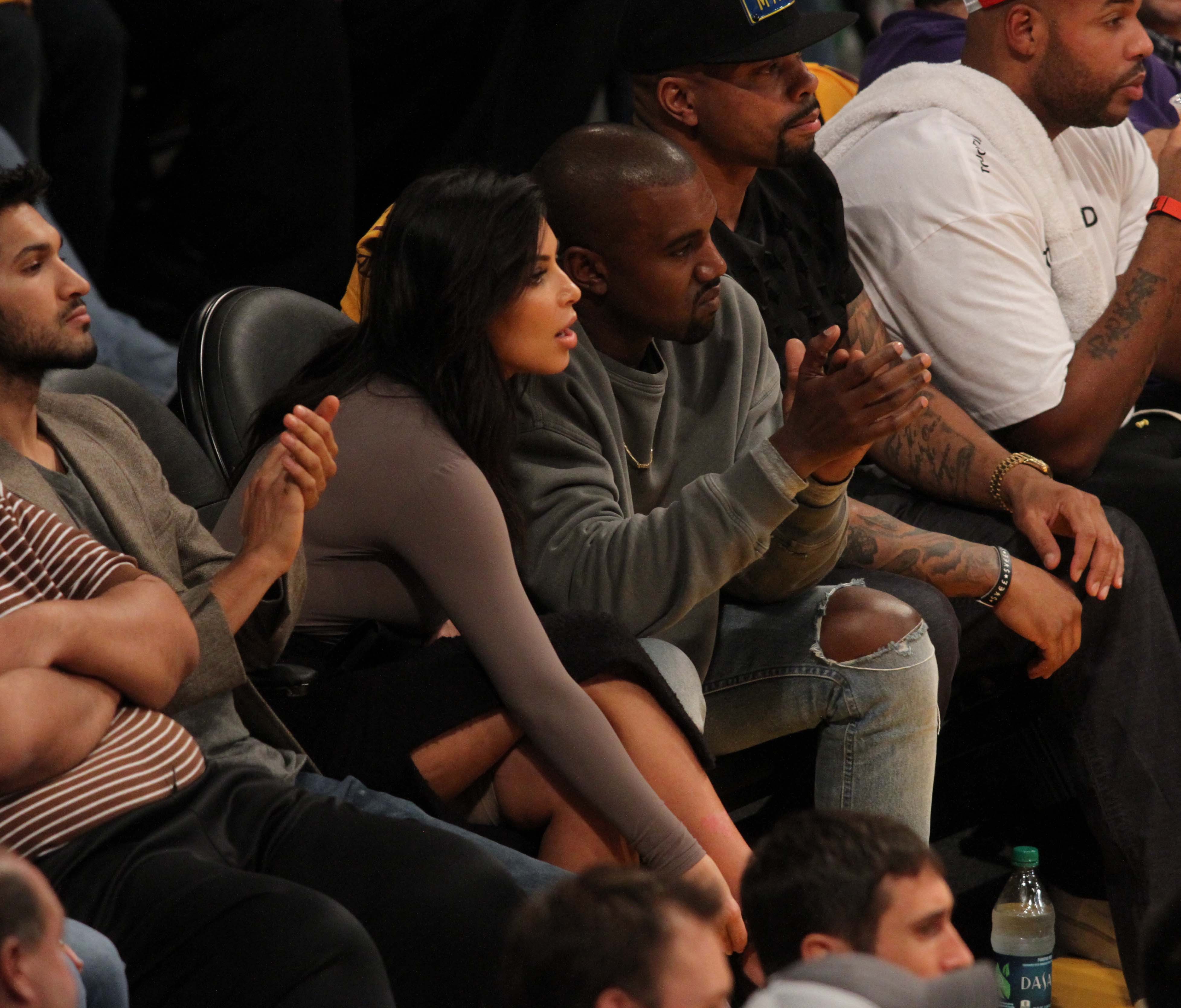 Kim Kardashian e Kanye West  (Foto: Splash News / AKM-GSI)