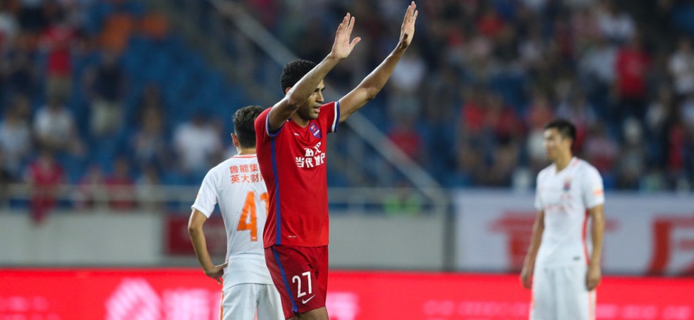 Alan Kardec comemora o gol da vitória do Chongqing Lifan (Foto: Osports)