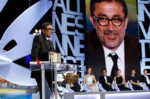 O diretor turco  Nuri Bilge Ceylan recebe, neste sábado (24) em Cannes, a Palma de Ouro por 'Winter Sleep'. (Foto: Valérie Hache/AFP)