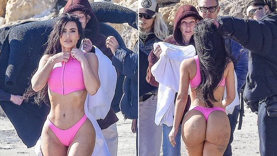Kim Kardashian escolhe biquíni fio-dental e com zíper para ensaio na praia