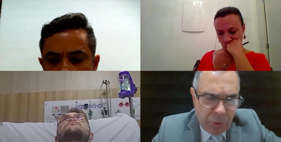 Medicado e hospitalizado, advogado tenta acompanhar audiência — Foto: Tribunal de Justiça Militar/Divulgação