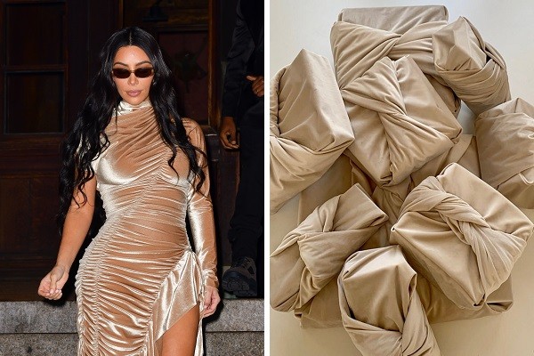 Kim Kardashian parece ter usado o mesmo tecido para fazer vestido de gala e embrulhar presentes de Natal (Foto: Getty Images/Instagram)