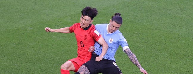 Uruguai e Coreia do Sul se enfrentam na fase do Grupo H da Copa do Catar — Foto: ADRIAN DENNIS/AFP