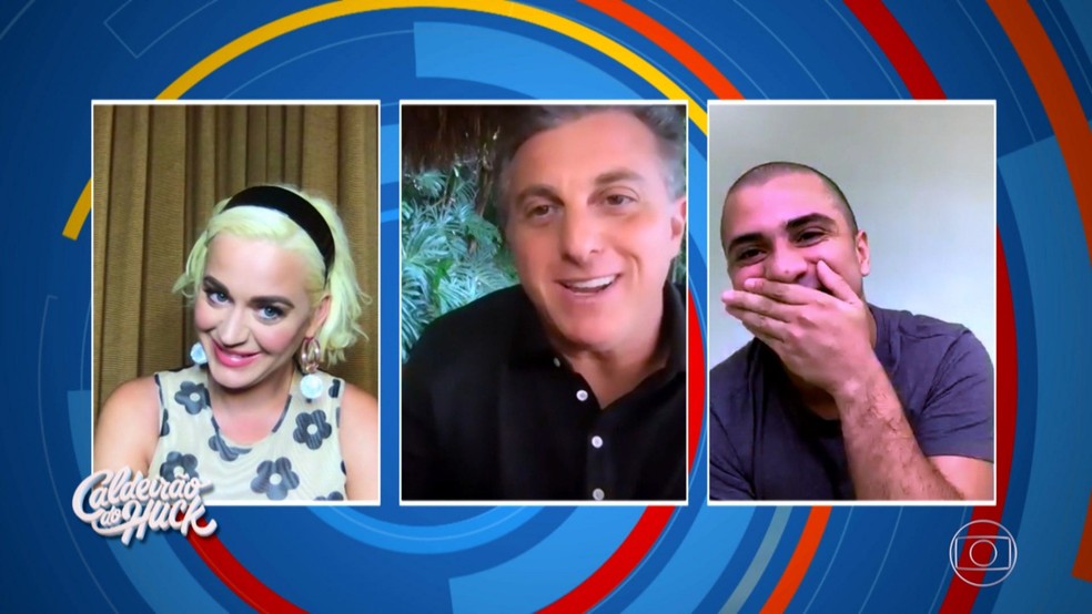 Fã é surpreendido por Katy Perry e Luciano Huck no Caldeirão — Foto: TV Globo