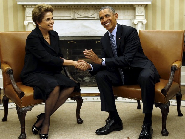A presidente Dilma Rousseff e o presidente dos EUA, Barack Obama, se reúnem no salão oval da Casa Branca, em Washington (Foto: Kevin Lamarque/Reuters)