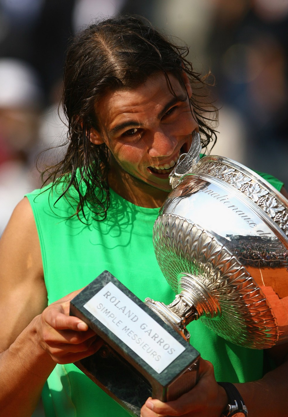 2008 - O tetra é conquistado, mais uma vez, em cima do suíço Roger Federer — Foto: Getty Images 