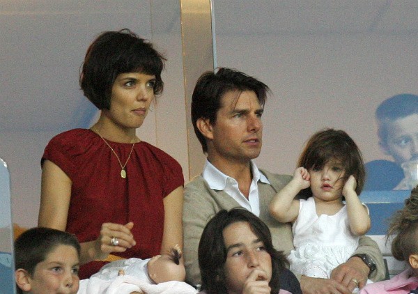 Tom Cruise e Katie Holmes com Suri quando ainda eram um casal (Foto: Getty Images)
