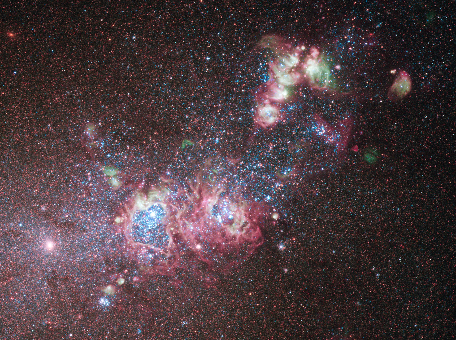 A galáxia NGC 4214, que fica a 10 milhões de anos-luz da constelação Canes Venatici (Foto:  NASA Goddard)