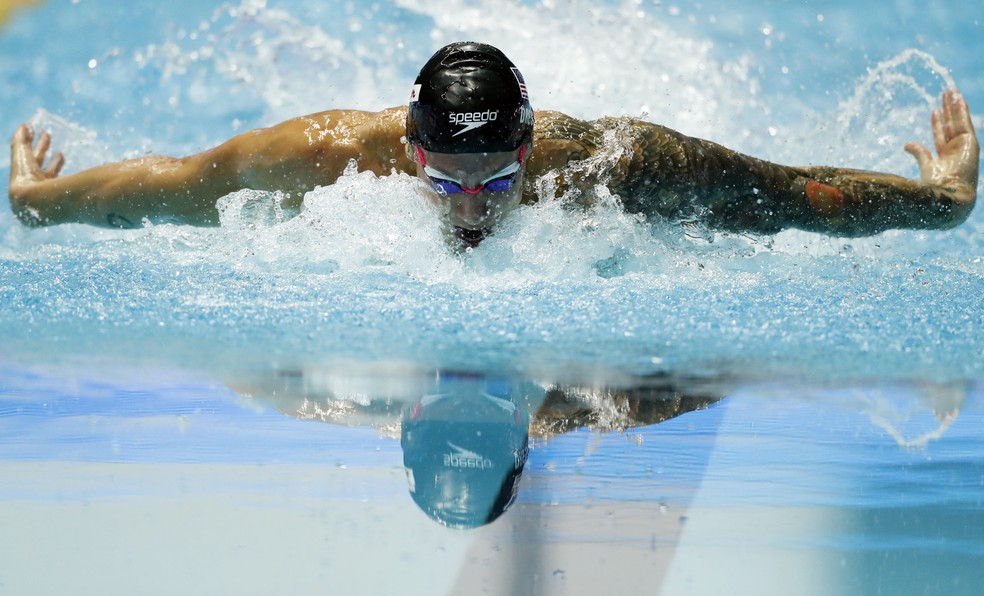 Caeleb Dressel na final dos 100m borboleta — Foto: Reuters