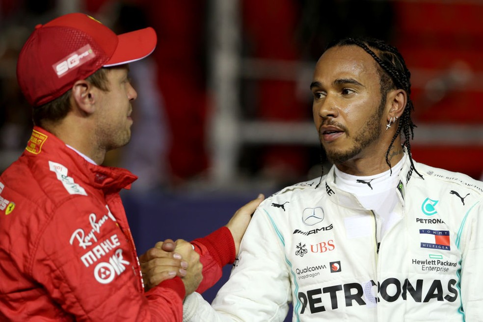 Lewis Hamilton e Sebastian Vettel no GP de Singapura de 2019 — Foto: Charles Coates/Getty Images