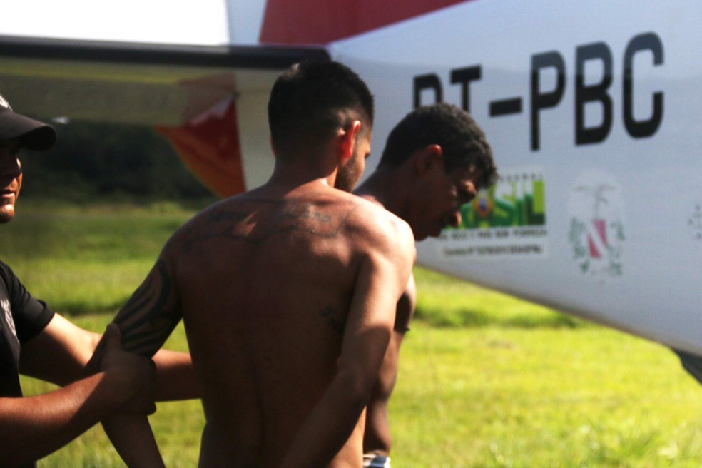 Presos de Altamira são transferidos após massacre. que deixou 57 mortos no Pará. — Foto: Bruno Cecim / Agência Pará