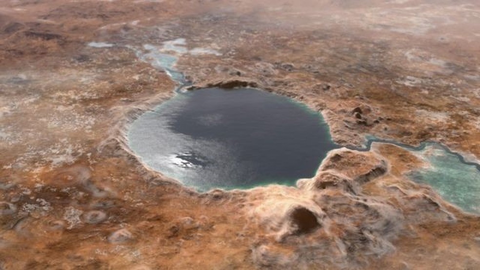 Uma ilustração mostra a Cratera Jezero, como ela teria sido há bilhões de anos atrás, se tivesse sido um lago — Foto: NASA/JPL-CALTECH