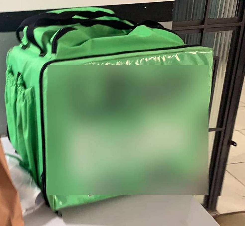Caixa usada por traficantes é característica de aplicativo de entrega de comida — Foto: Polícia Civil - MT