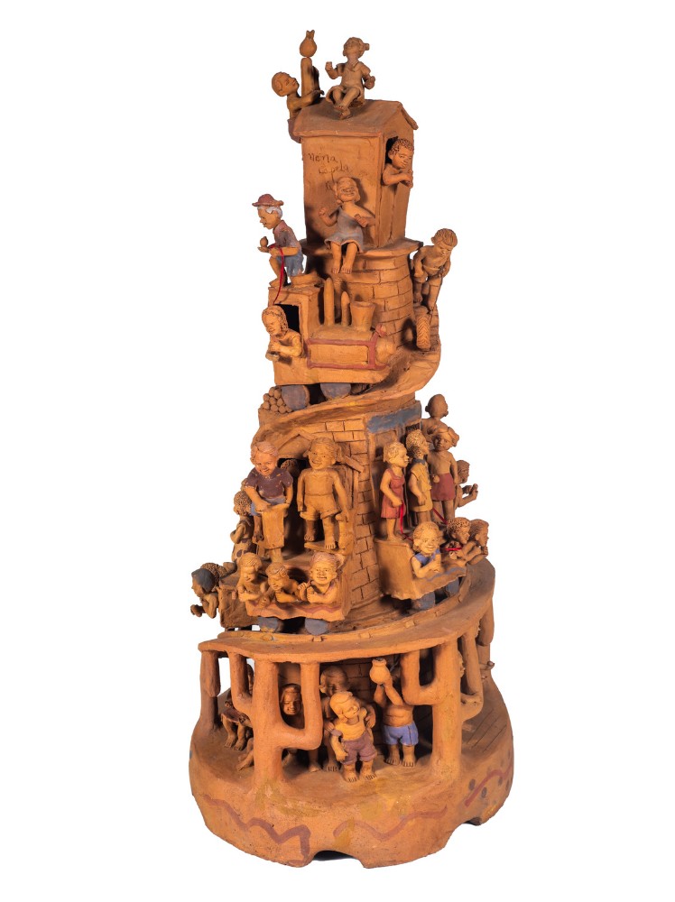 Com 37 kg e quase 1,5 m de altura, esta é a peça “Trem com brincadeira de criança”, em que Nena de Capela  distribui meninos e meninas em vagões que sobem uma torre (Foto: Acervo do CRAB / Reprodução)