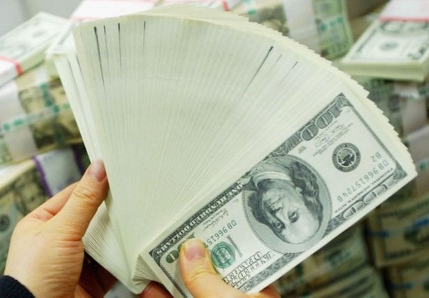 Banco Central dos EUA deu sinal verde para emissão de dinheiro e inundou mundo com dólares (Foto: Getty Images via BBC)
