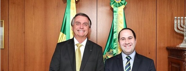  Antônio Cristovão Neto, conhecido como Queiroguinha, ao lado do presidente Jair Bolsonaro — Foto: Reprodução/Instagram