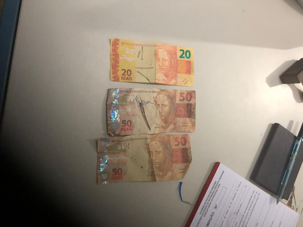 Jovem é preso com mais de R$ 1,5 mil em notas falsas e diz que as comprou na internet, em RO (Foto: Edson Nascimento/TBN notícias)