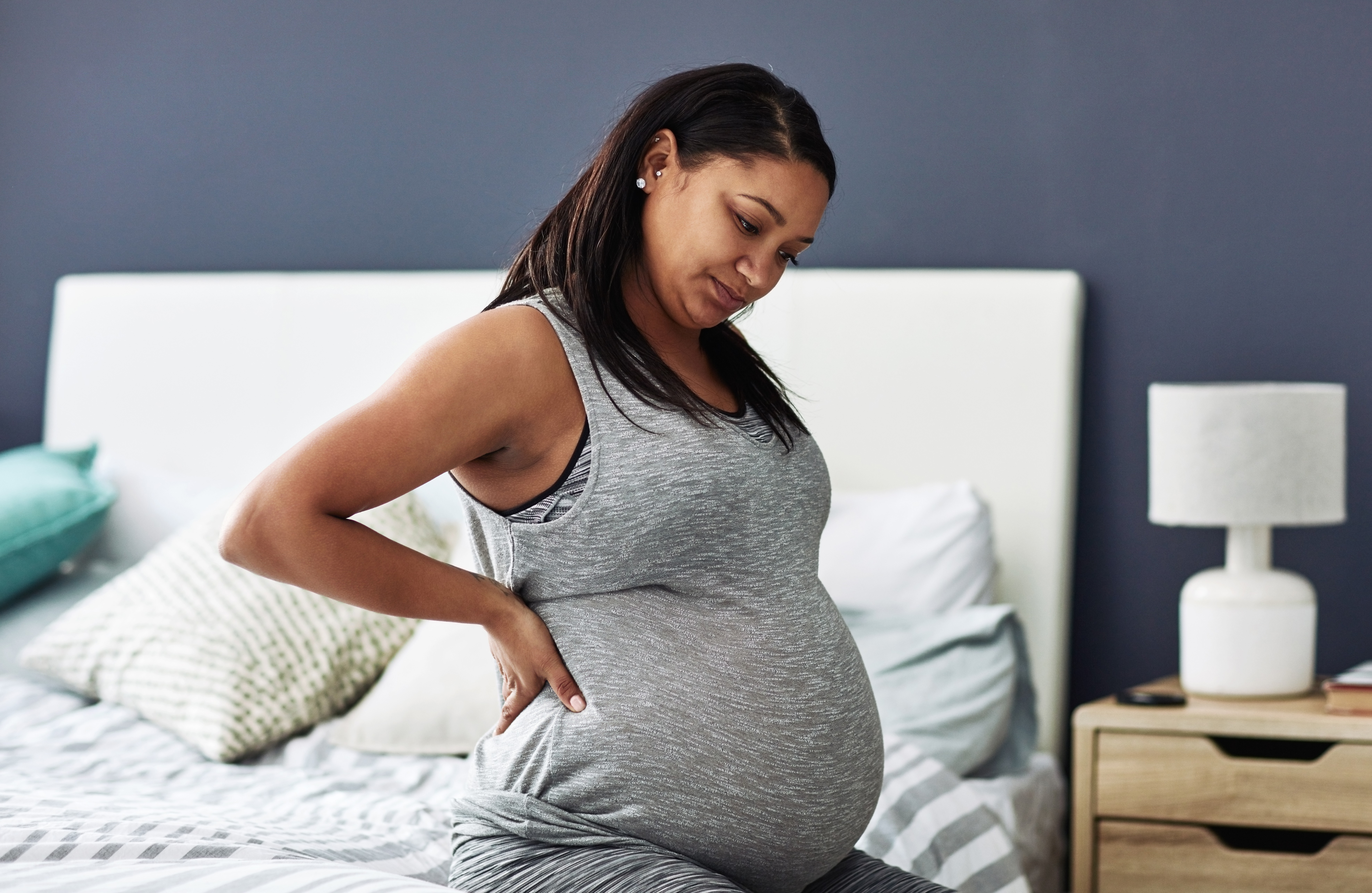 Dor muscular na gravidez pode estar relacionada à nutrição? (Foto: Getty Images)