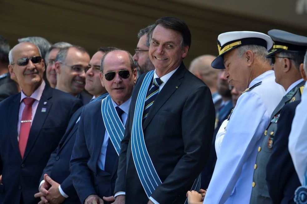 O presidente Jair Bolsonaro nesta sexta-feira (18) durante cerimônia comemorativa do Dia do Aviador e da Força Aérea — Foto: Marcelo Camargo / Agência Brasil