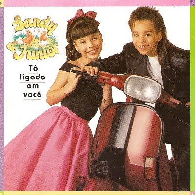 Sandy e Junior na capa do álbum Tô Ligado em Você, de 1993, inspirado em Grease (Foto: Reprodução)