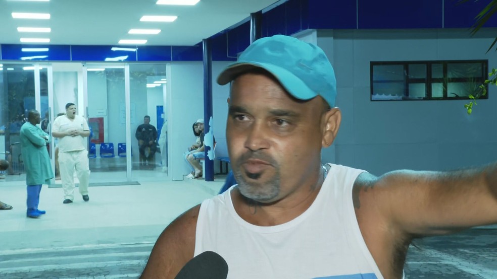 Alexsandro, pai de Paulo Vítor Barros, baleado na cabeça em Magé — Foto: Reprodução/TV Globo