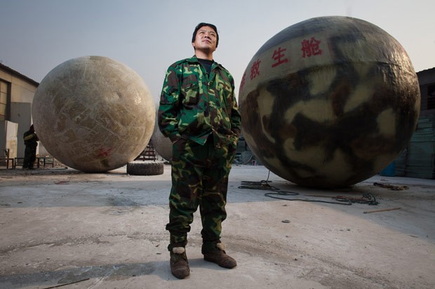 O fazendeiro chinês Liu Qiyan e sua 'Arca de Noé' (Foto: Ed Jones/AFP)