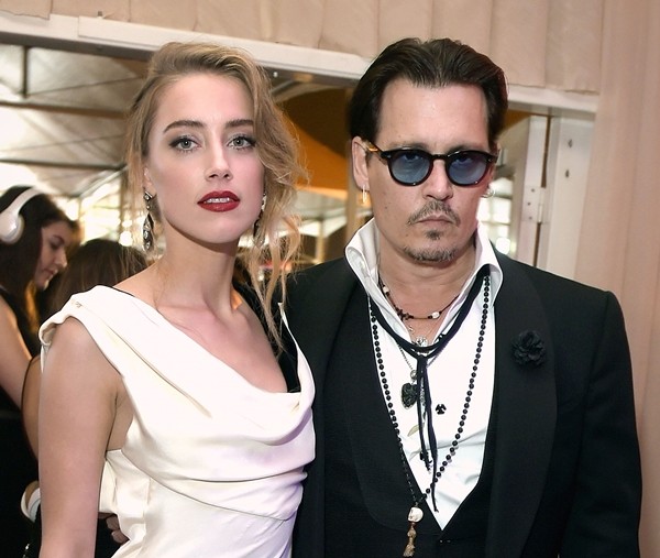 Amber Heard e o marido, Johnny Depp (Foto: Getty Images)