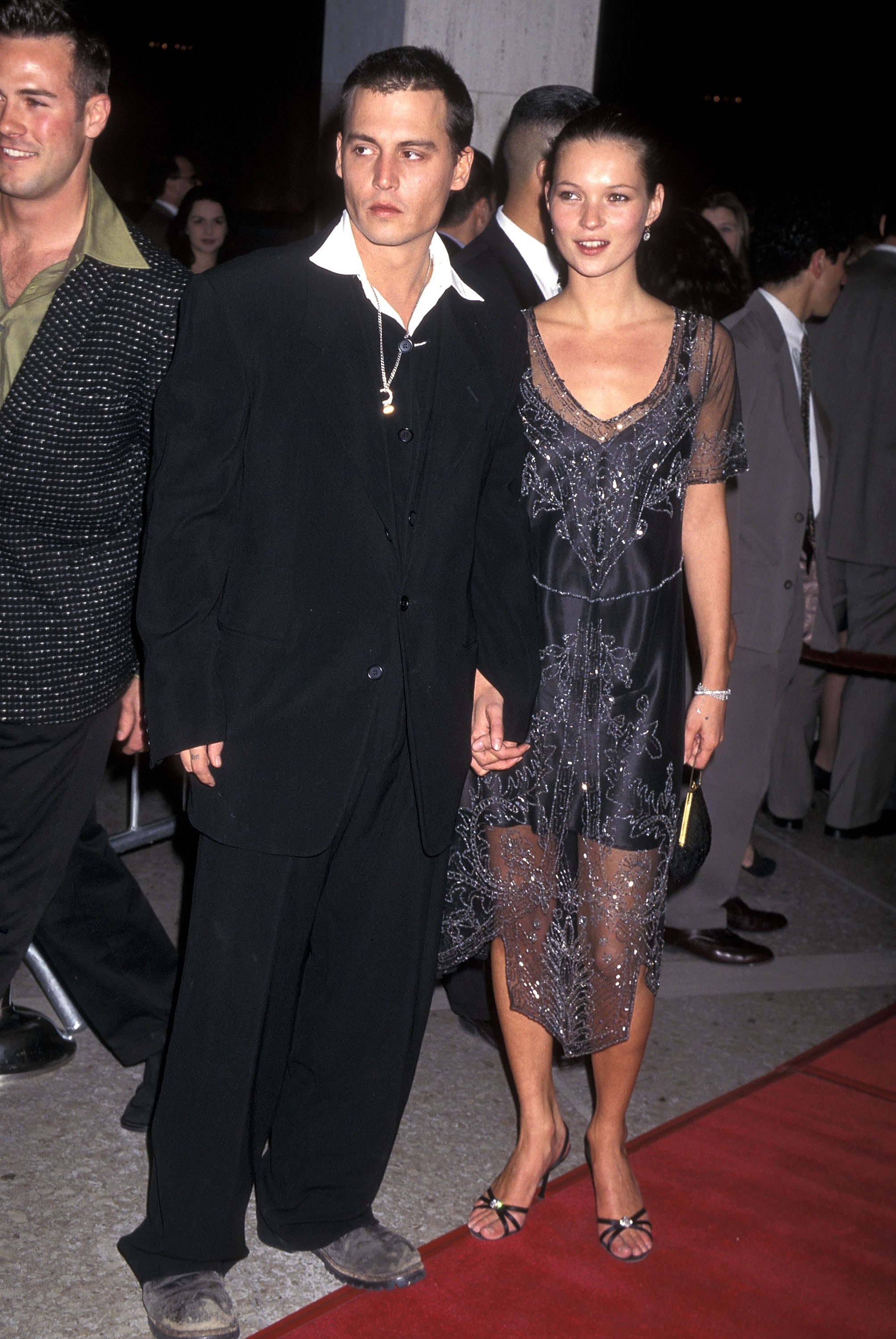 Ao lado de Johnny Depp, em 1997 (Foto: Getty Images)