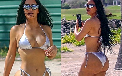 Kim Kardashian é clicada de biquíni metálico em praia