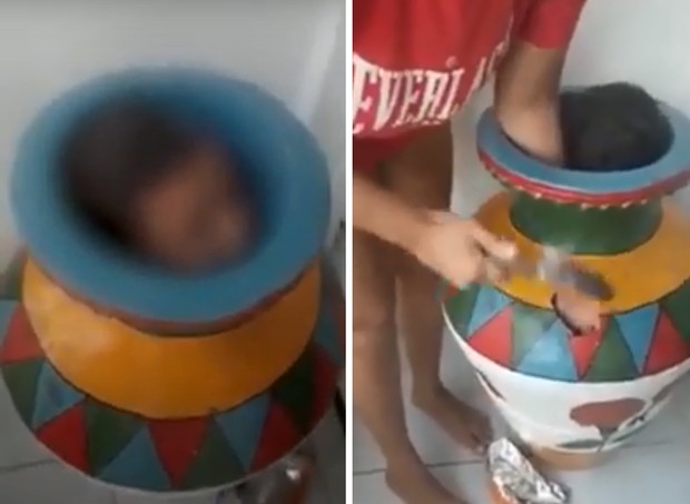 Foi preciso quebrar vaso para tirar menino (Foto: Reprodução Youtube)