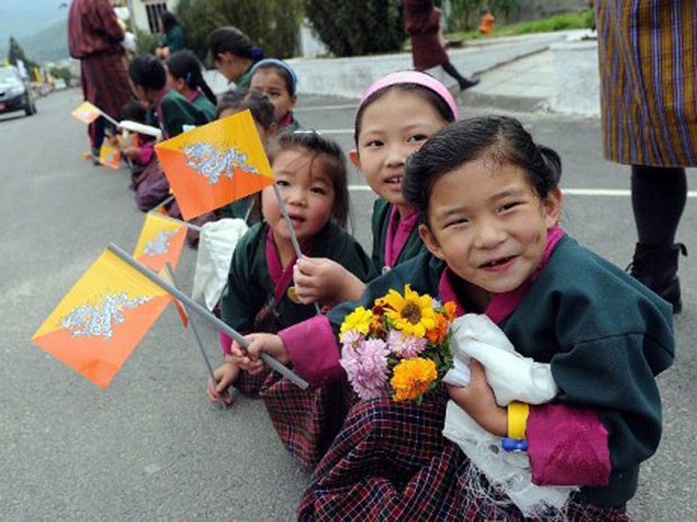 Crianças butanesas (Foto: Prakash Singh;AFP)