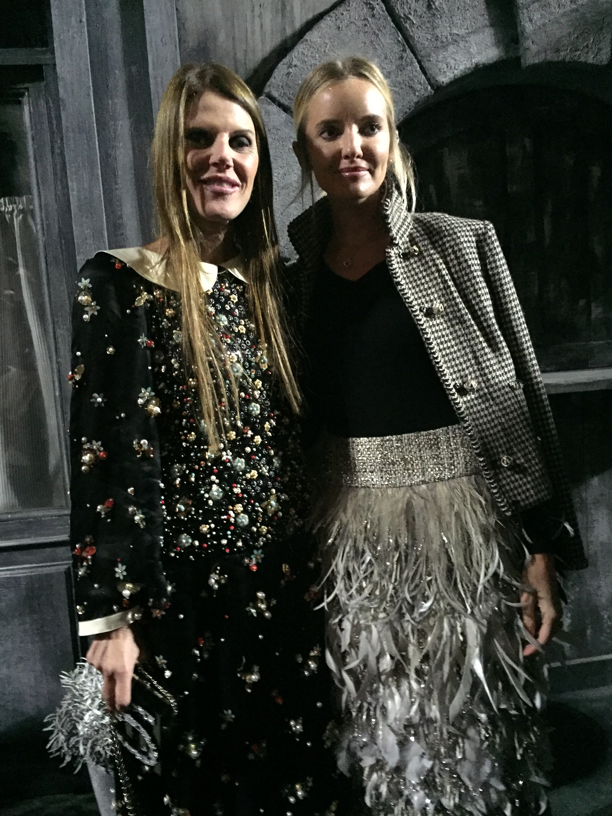 Anna Dello Russo, left , with a look from the show (Foto: SuzyMenkesVogue)