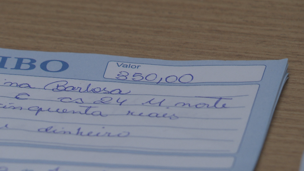 Recibo de pagamento de suposta vítima de golpe de venda de emprego no DF (Foto: TV Globo/Reprodução)