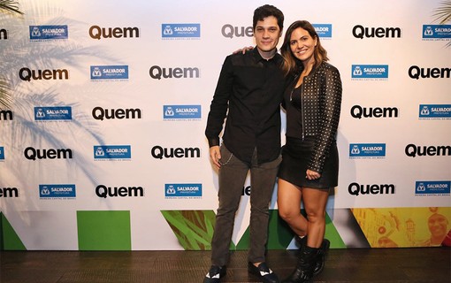 Danilo Saraiva, editor-chefe de QUEM, e a promoter Carol Sampaio