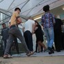 Foto: (Eleições 2018 SC: Eleitores chegaram cedo para votação no CEFID da Udesc, em Florianópolis / Estrela/NSC)