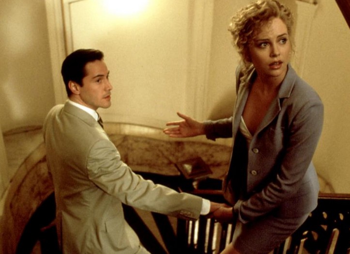 Charlize Theron com Keanu Reeves em cena de O Advogado do Diabo (1997) (Foto: Reprodução)