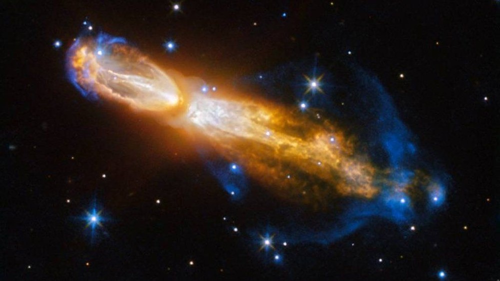 No fenômeno, jatos de gás e poeira são lançados em direções opostas (Foto: ESA/Hubble NASA - Judy Schmidt)