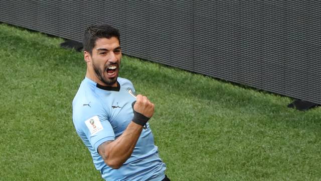 Surez comemora gol que definiu a vitria do Uruguai contra a Arbia Saudita