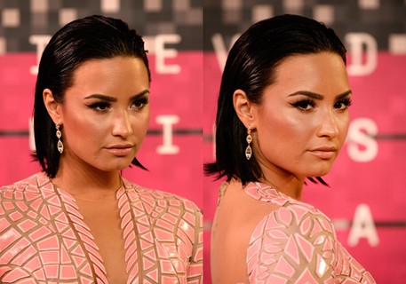 Demi Lovato penteou o cabelo molhado para trás