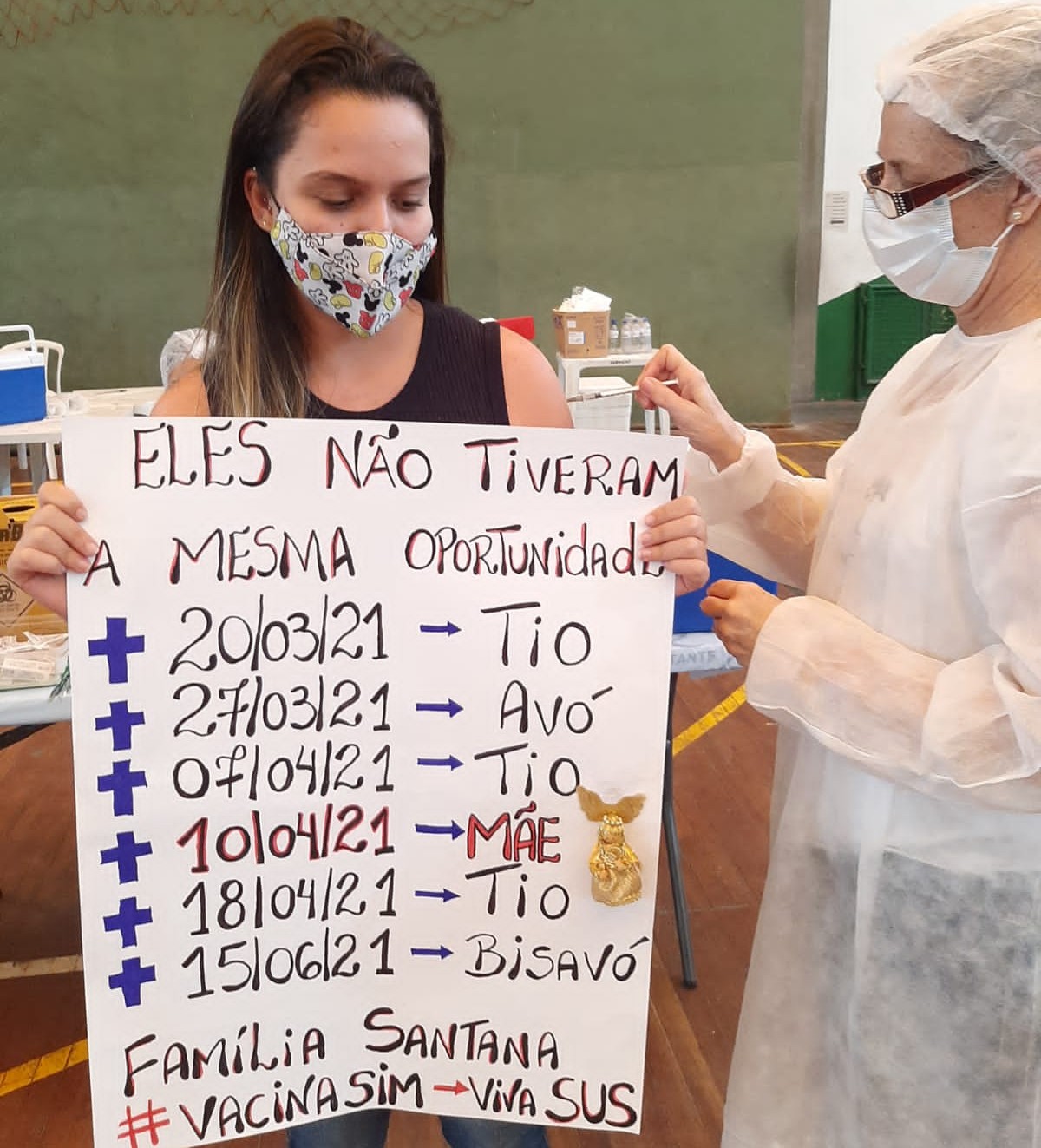 Garota que perdeu a mãe e 5 parentes para a Covid comove ao ser imunizada